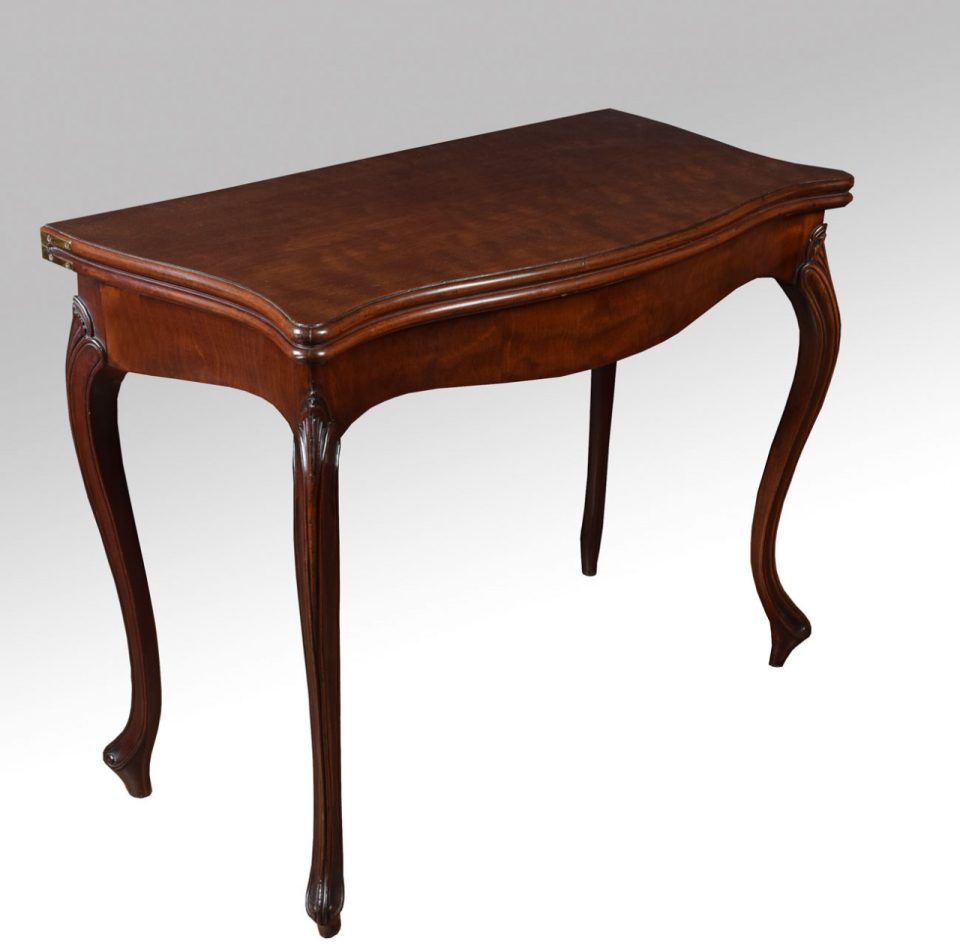 George III mahogany serpentine card table in the French Hepplewhite taste