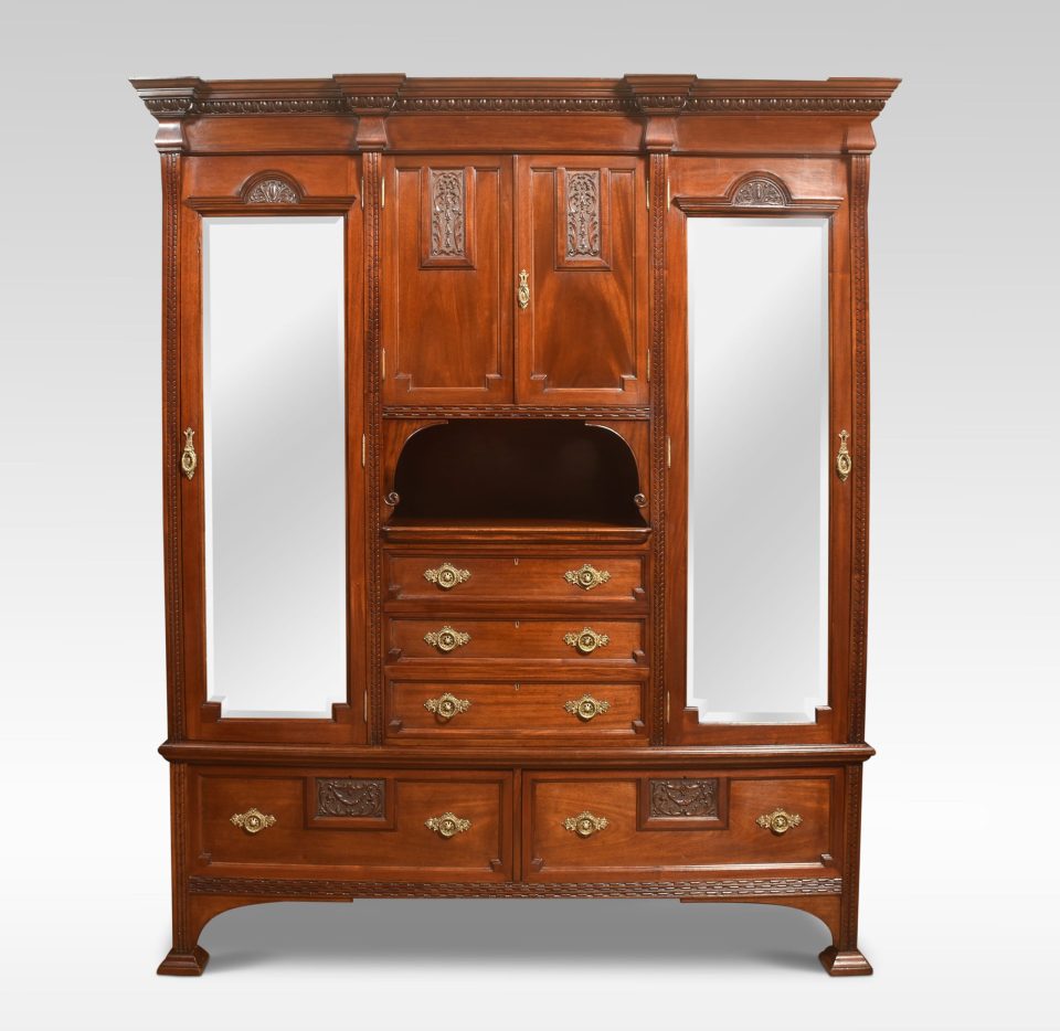 Carved mahogany compactum wardrobe
