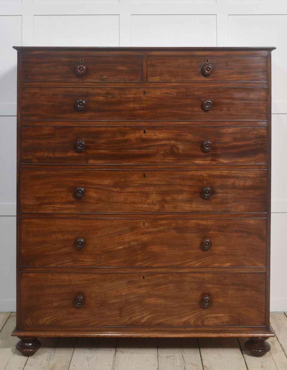 Tall mahogany chest of drawers