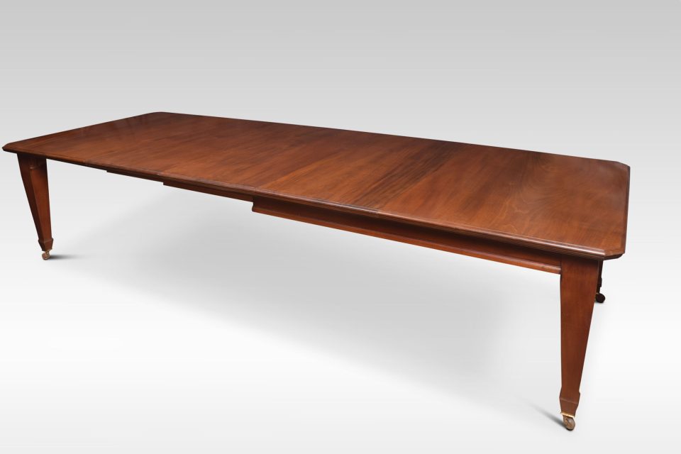 Walnut extending dining table