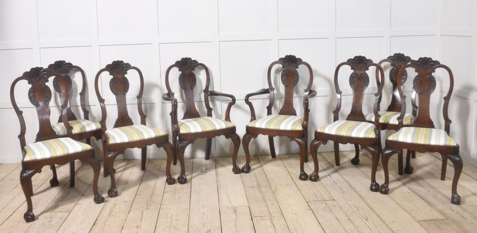 Set of eight walnut dining chairs