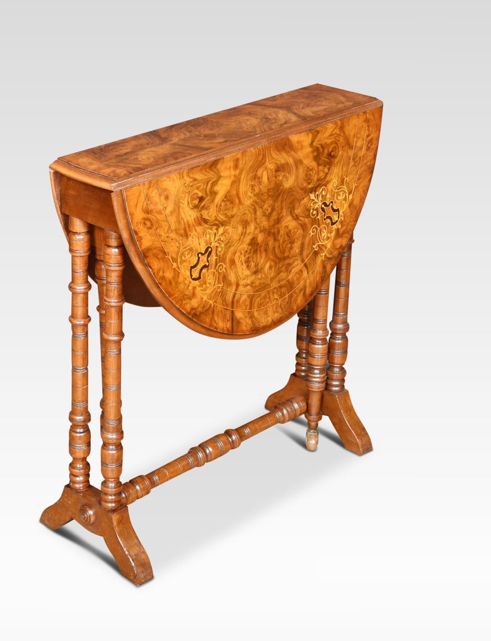 Baby walnut Sutherland table