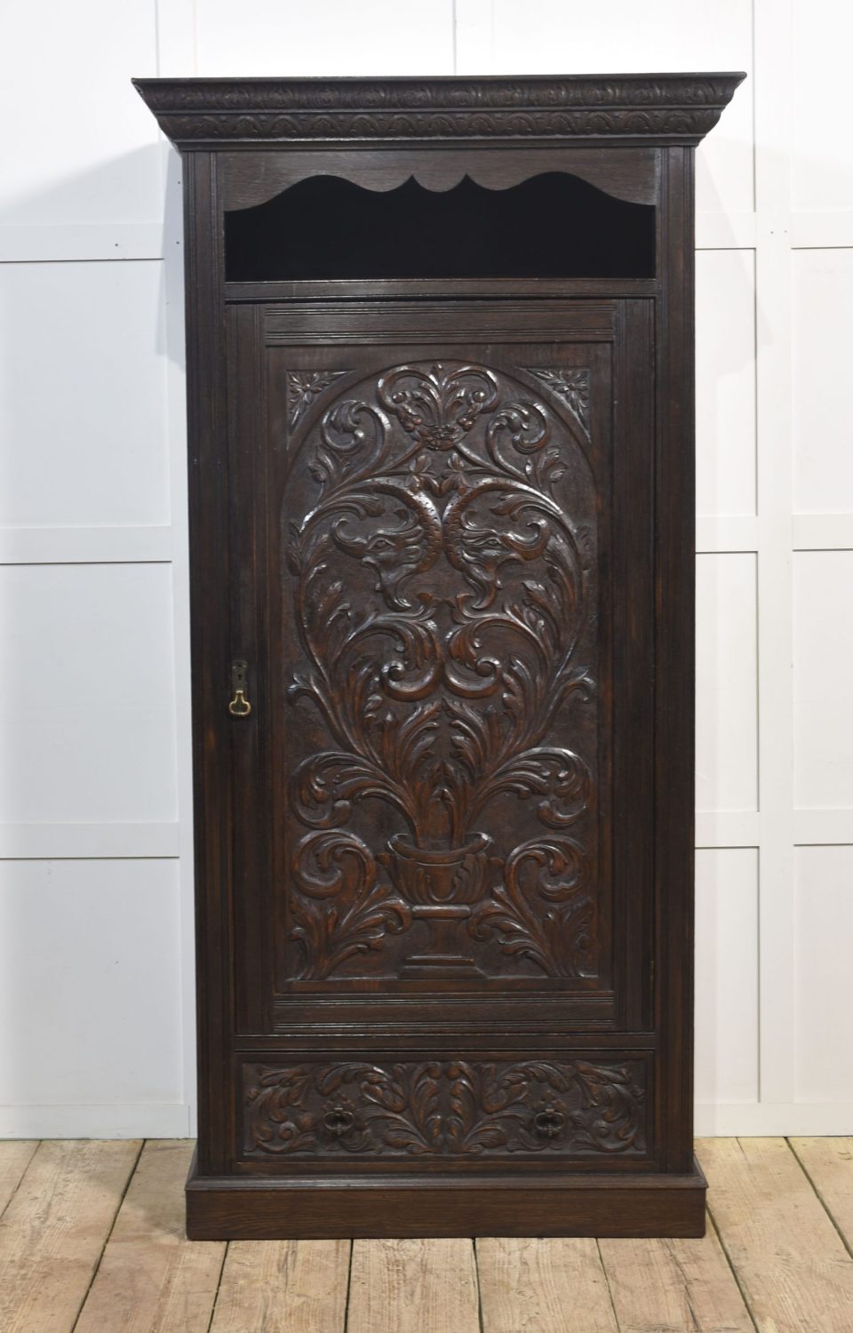 Carved oak hall robe