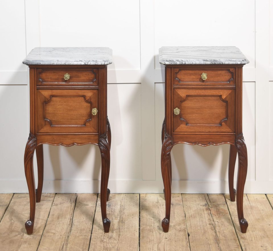 Pair of walnut marble top bedside cabinets