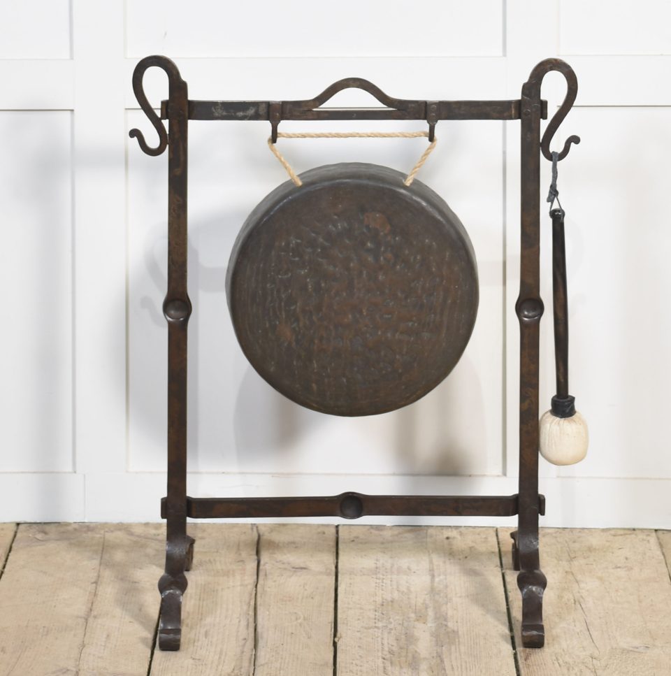 Wrought iron framed dinner gong