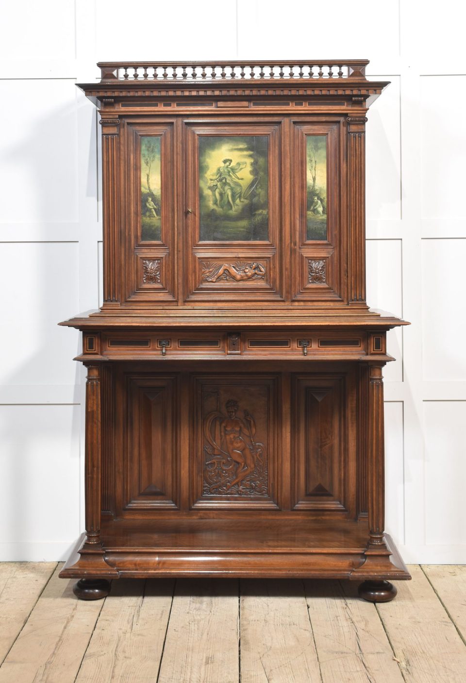 Walnut carved cabinet on stand