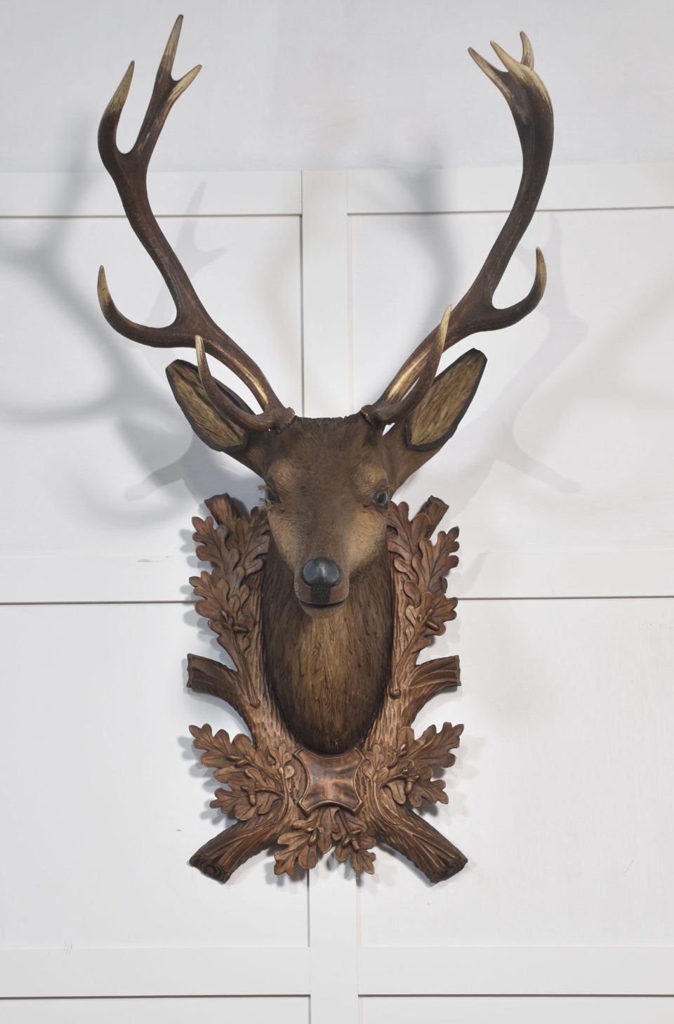 Large carved polychrome decorated stags head