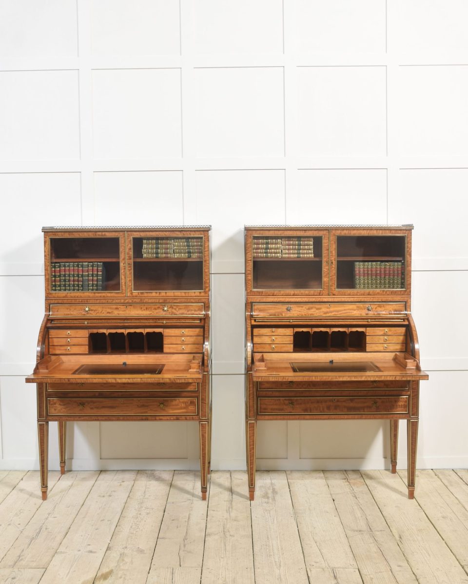 Pair of important Georgian satinwood cylinder cabinets