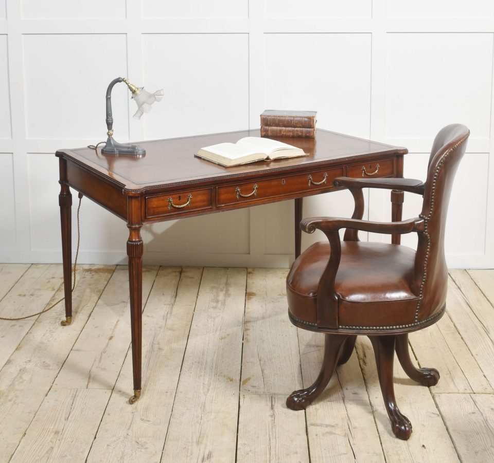 Mahogany three drawer writing table