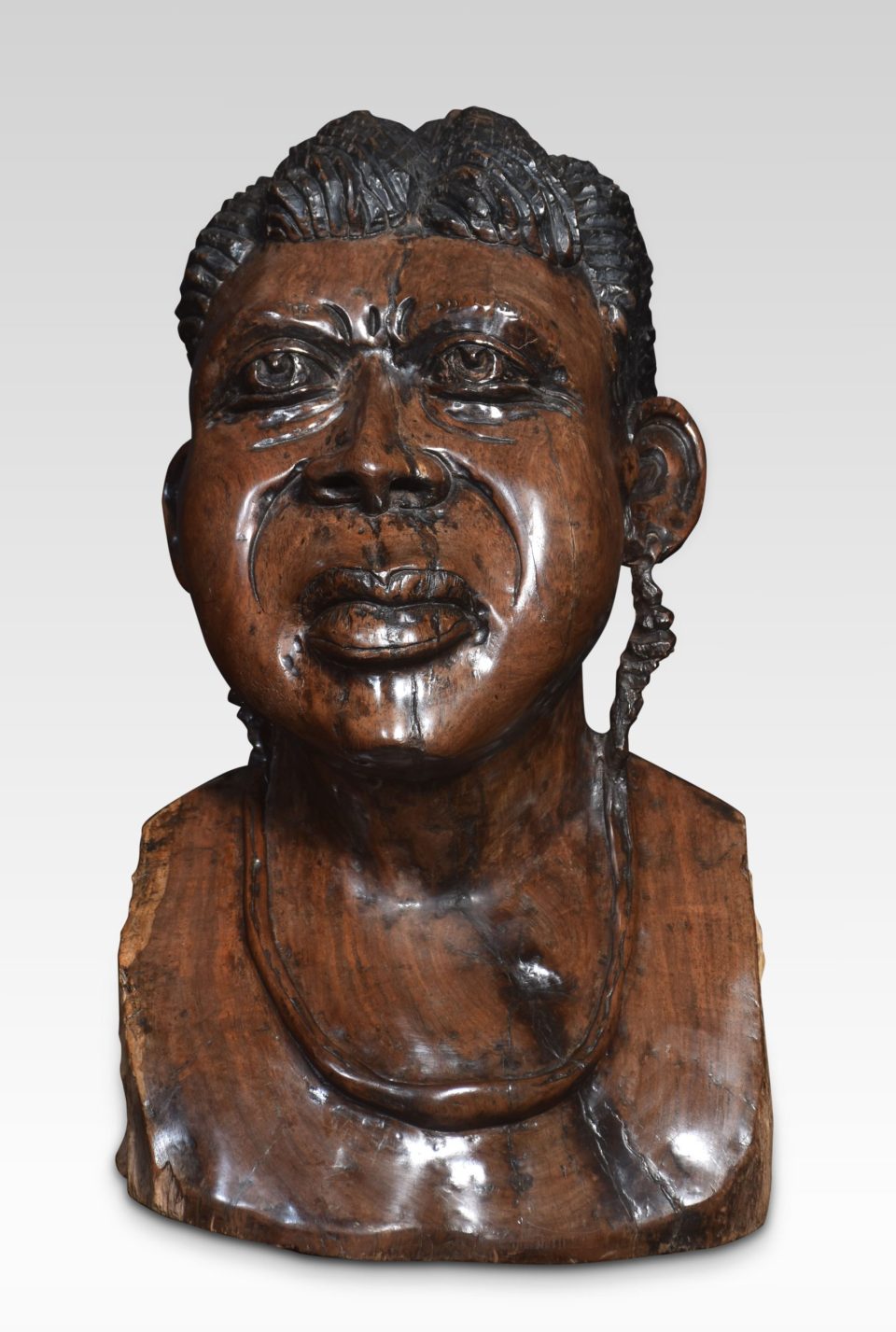 Carved bust of a tribeswoman