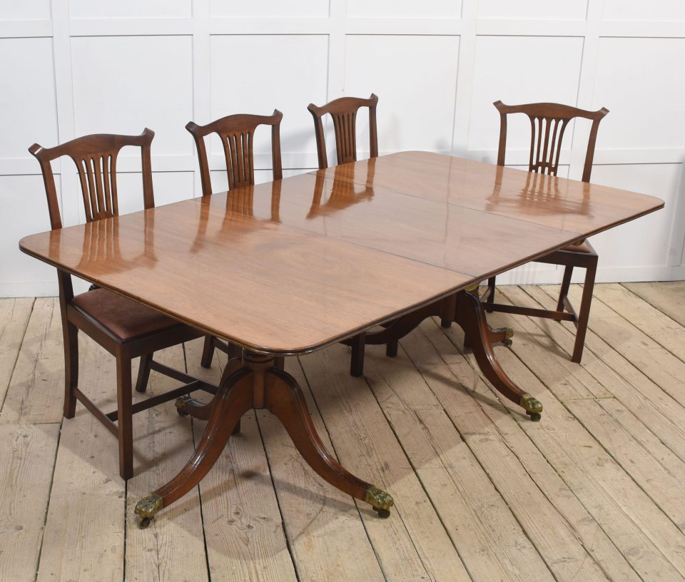 Regency mahogany twin pillar dining table