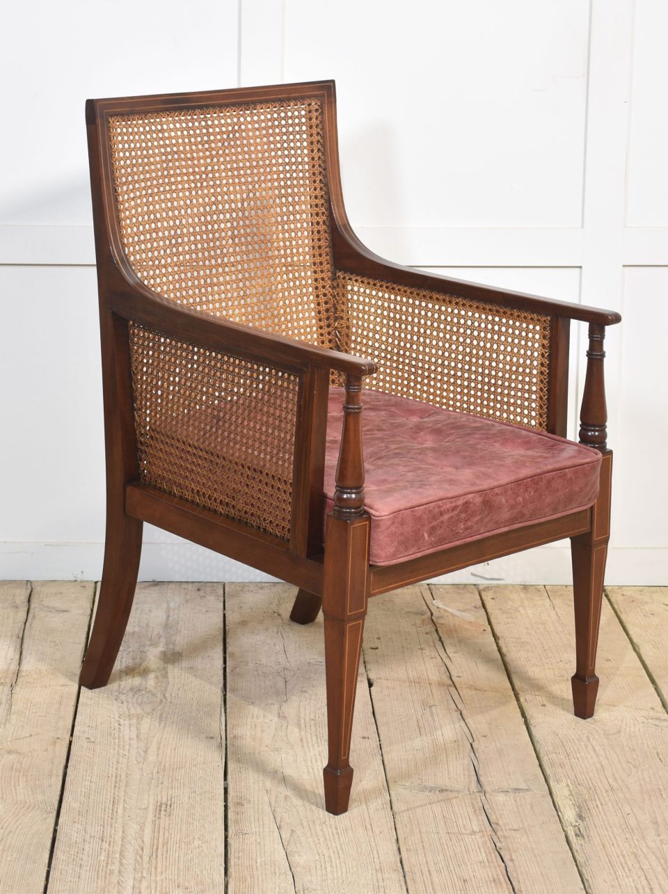 Mahogany inlaid bergere armchair