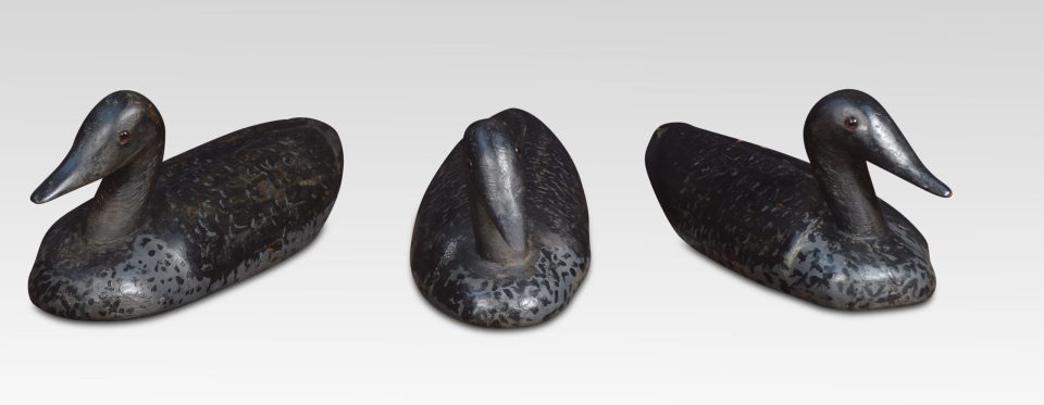 Set of three carved wood decoys