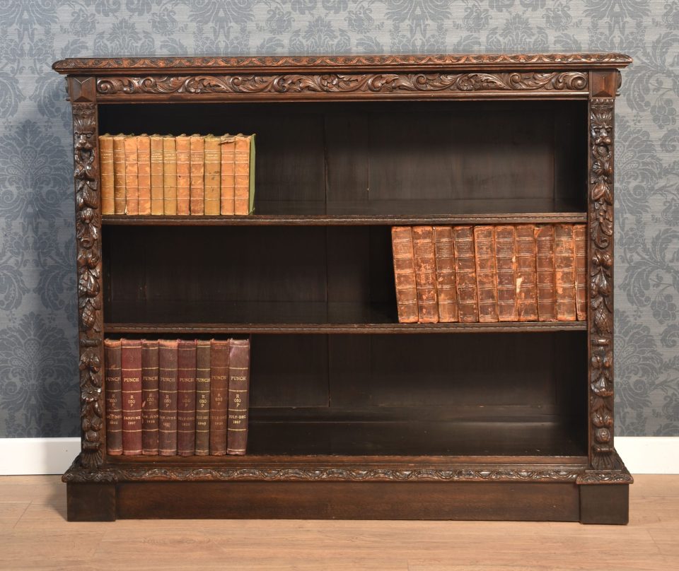 Carved oak open bookcase