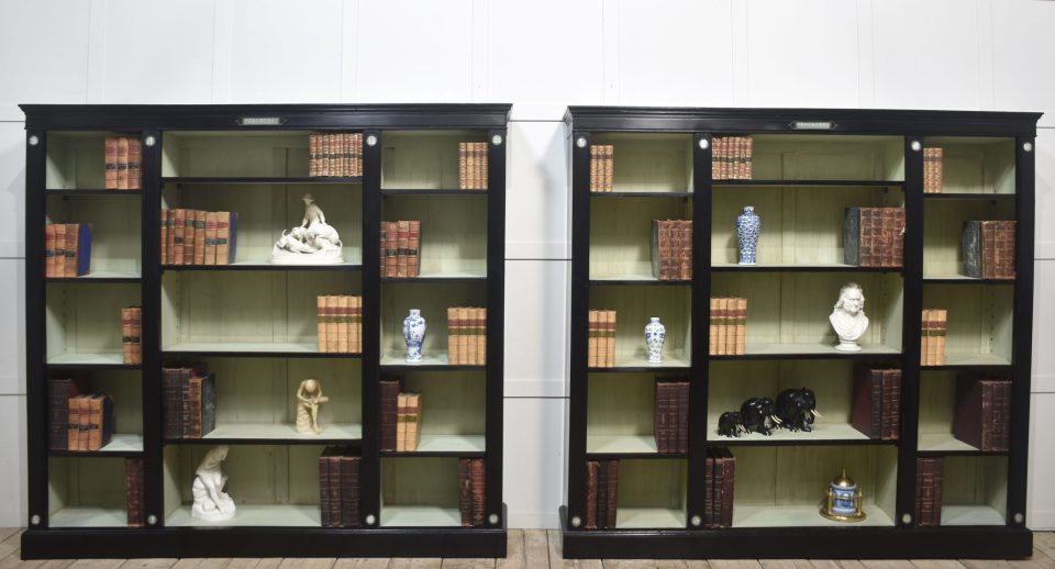 Pair of Ebonised Wedgwood open bookcases