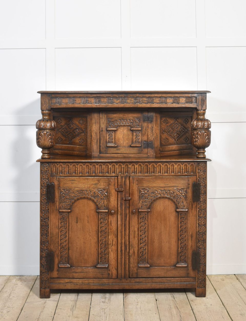 Carved oak court cupboard
