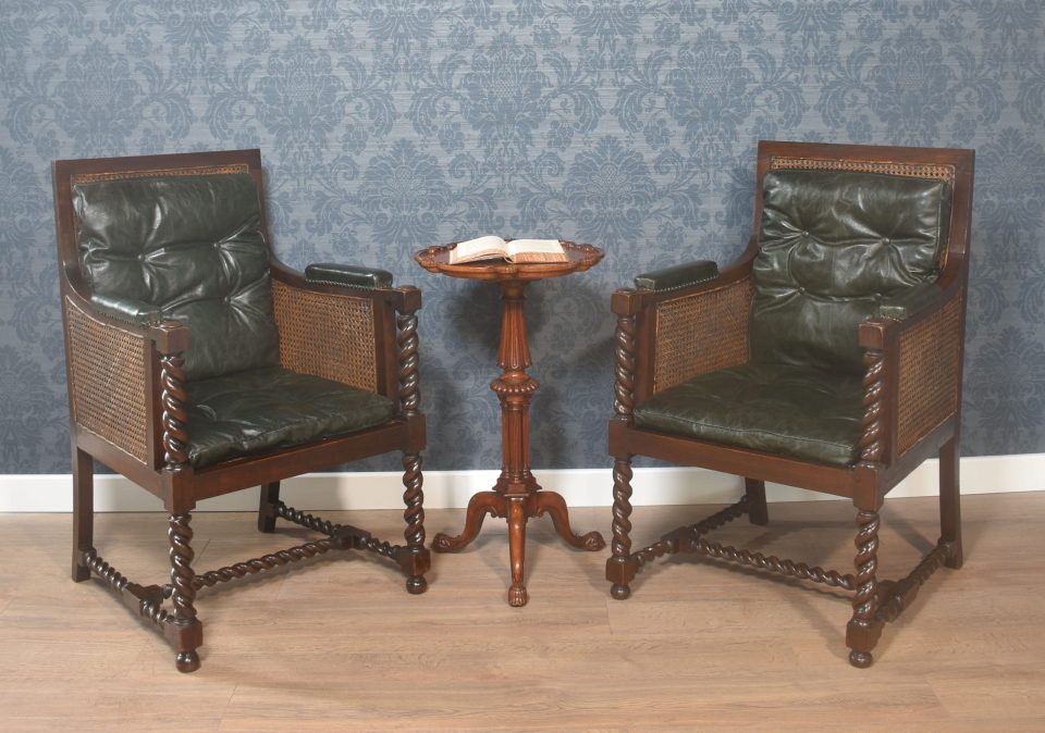 Pair of oak bergere library chairs