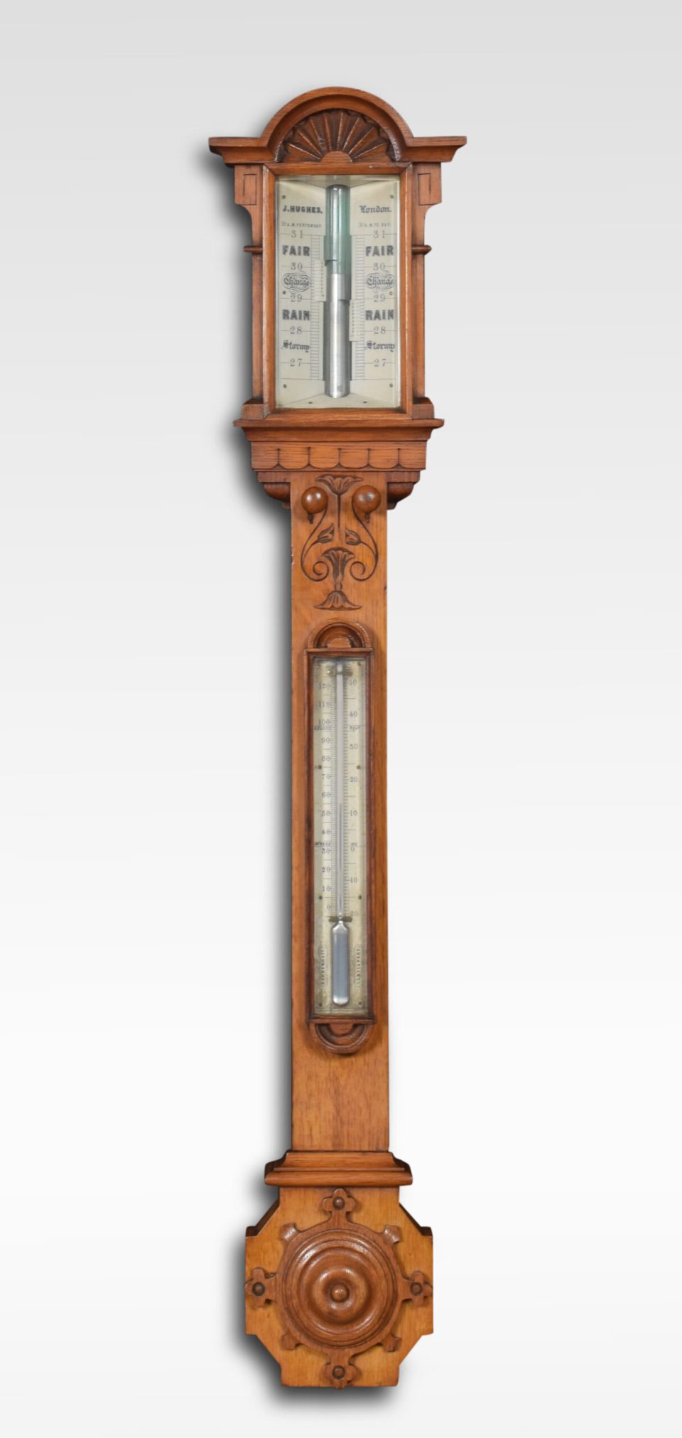 Oak cased stick barometer by J Hughes London