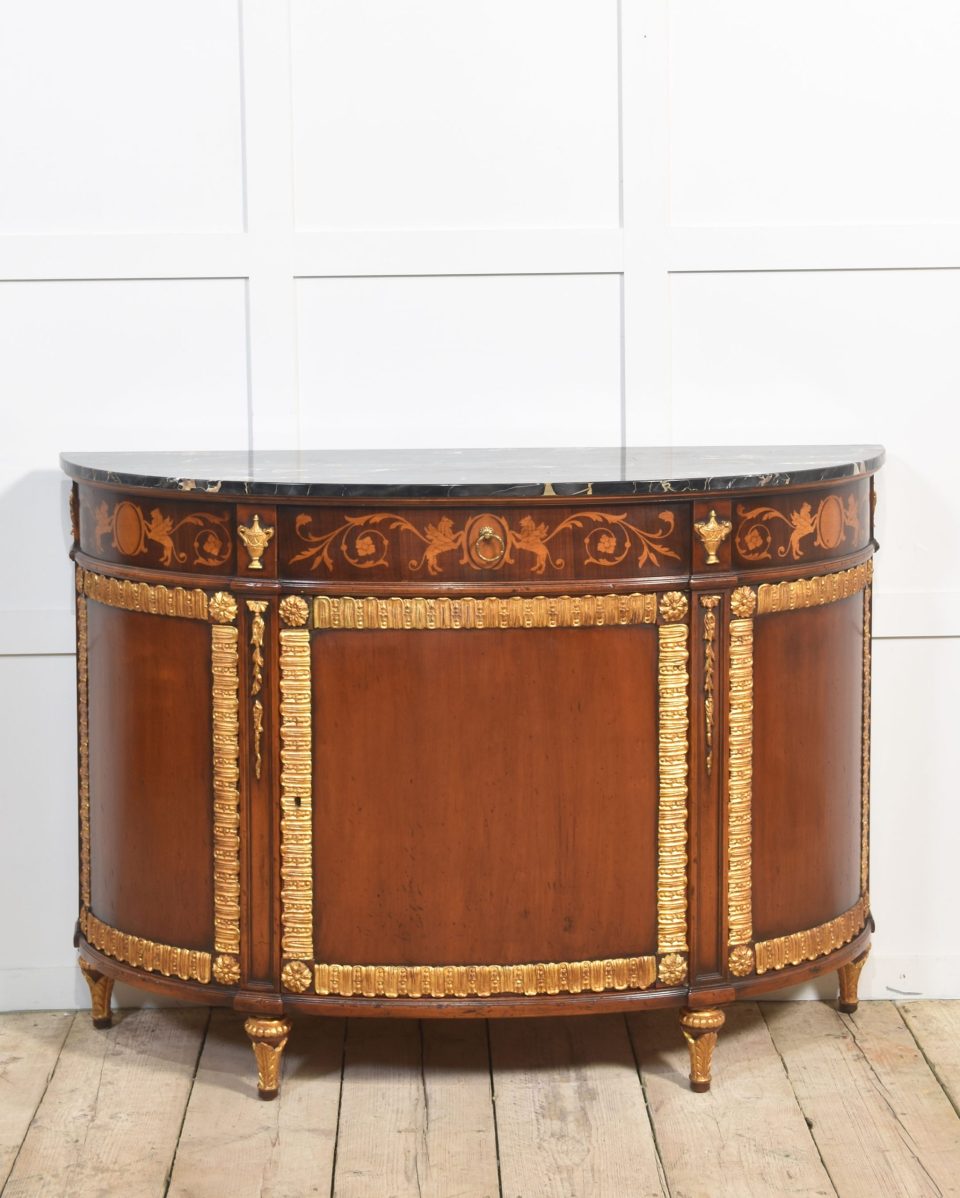 Italian marquetry and mahogany parcel gilt bow front cabinet