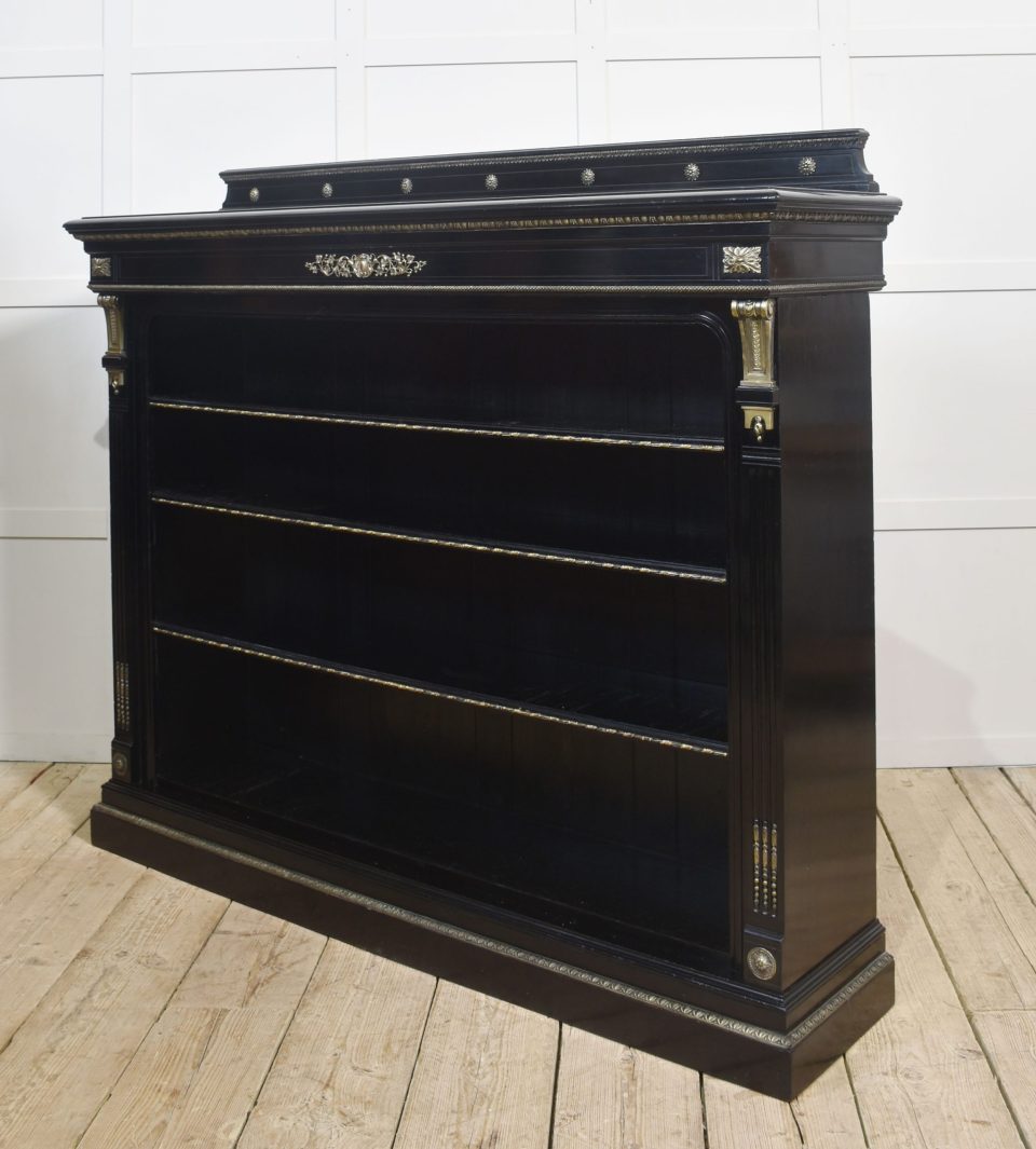 Large ebonised brass mounted open bookcase