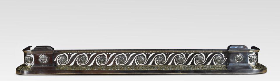 Regency steel and brass fender in the manner of George Bullock
