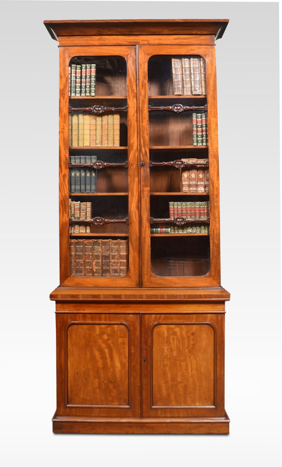 Mahogany two door narrow bookcase