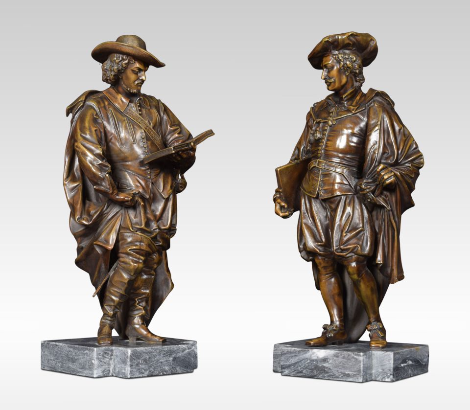 Pair of bronzed figures on marble bases