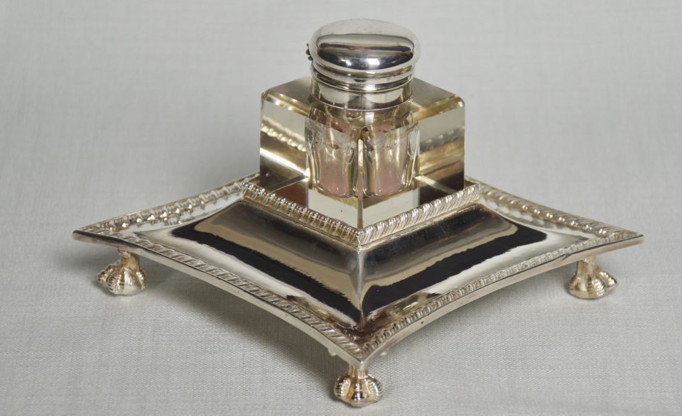 Silver plated and clear glass ink well by Walker and Hall