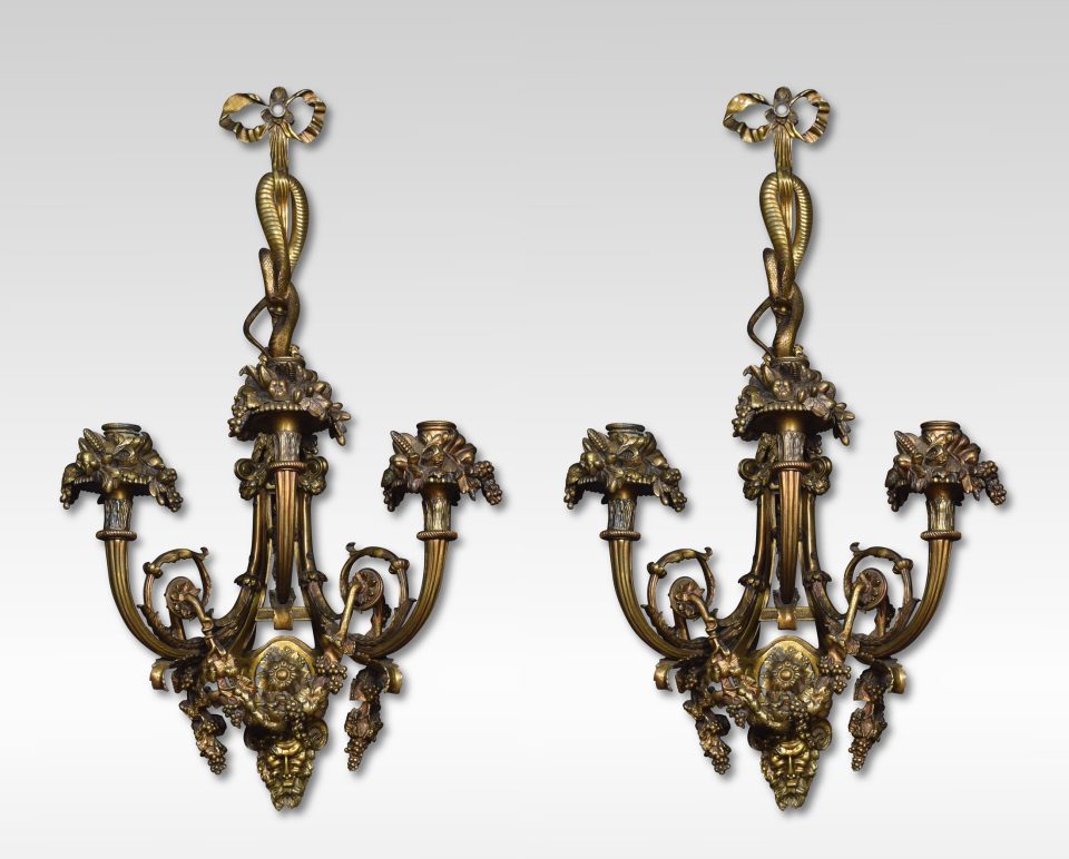 Pair of important French Louis XIV style gilt bronze three arm wall sconces