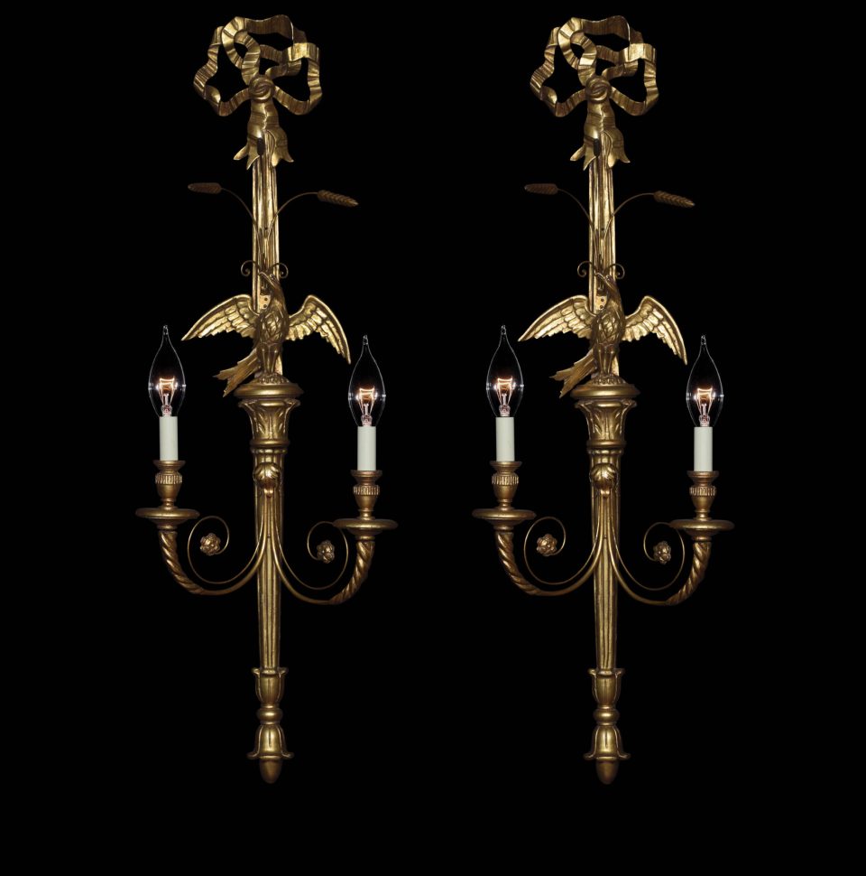Pair of carved and gilded wall lights
