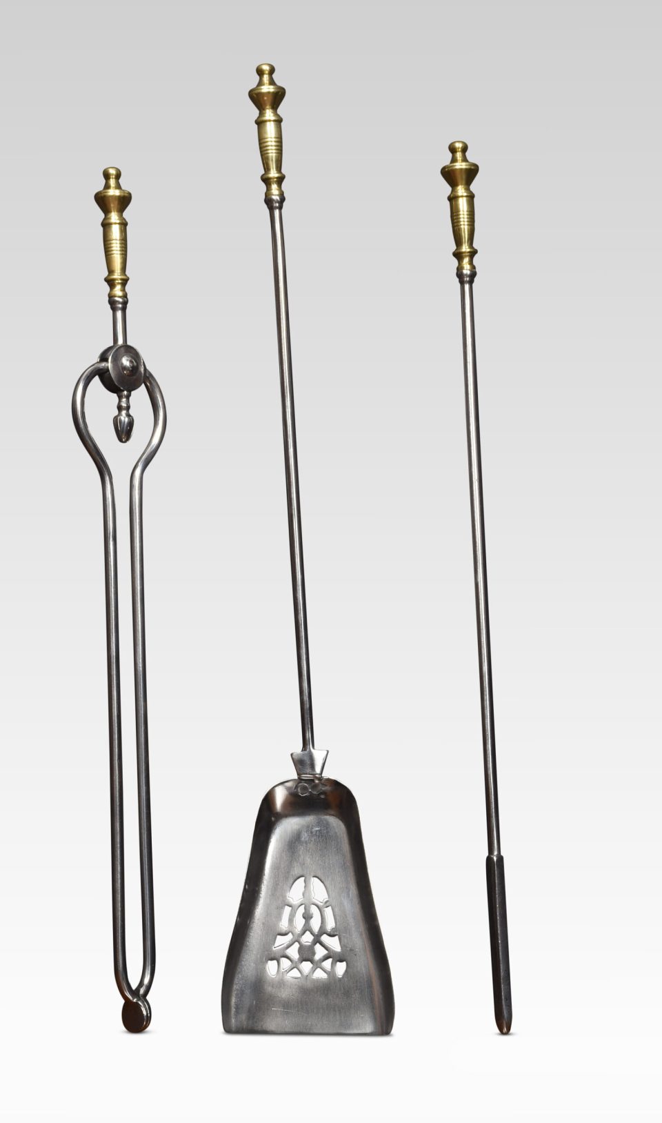 Polished steel and brass triple companion fire tools