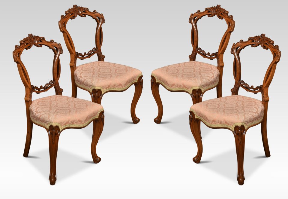 Set of four walnut balloon back salon chairs