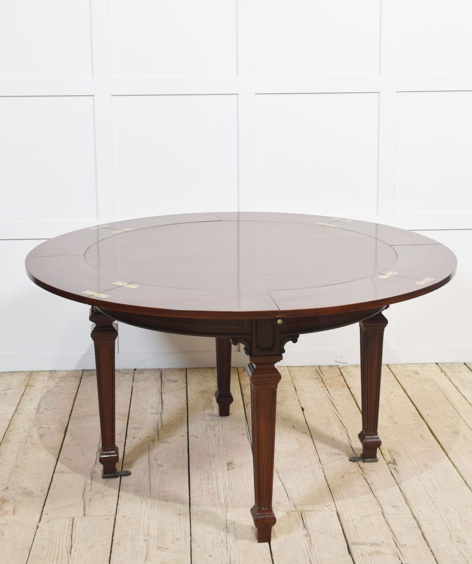Mahogany circular extending dining table