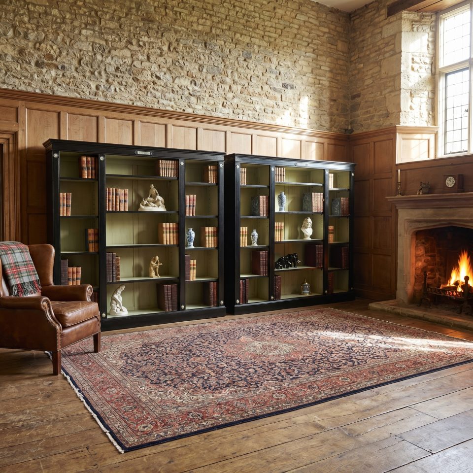 Pair of Ebonised Wedgwood open bookcases